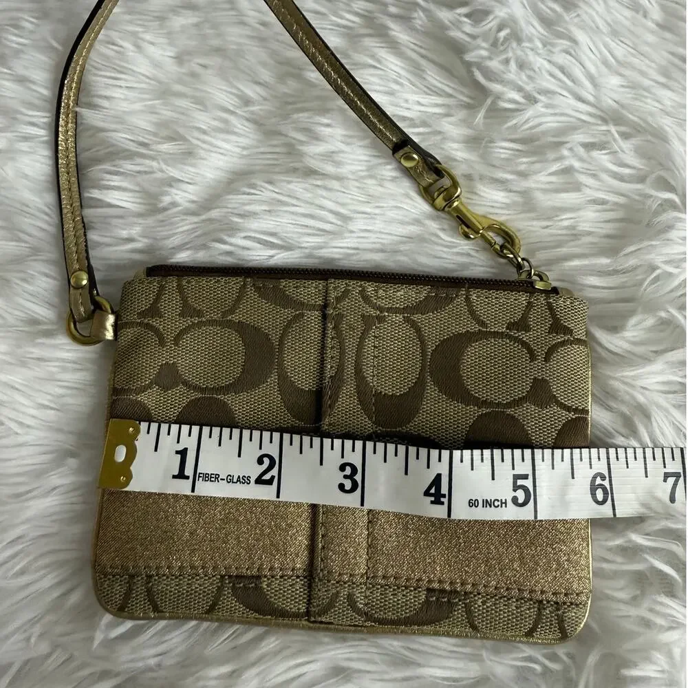 COACH Brown Gold Signature Canvas Wristlet